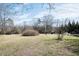 Large backyard perfect for gardening, recreation, or simply enjoying the outdoors at 204 N Sixth St, Mebane, NC 27302