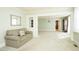 Bright living room with open layout, fireplace, built-ins, and neutral color palette at 204 N Sixth St, Mebane, NC 27302