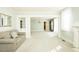 Bright living room with open layout, fireplace, built-ins, and neutral color palette at 204 N Sixth St, Mebane, NC 27302