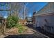 Spacious backyard featuring garden area and outdoor seating at 207 Linden Ave, Raleigh, NC 27601