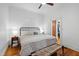 Bright bedroom with wood floors, neutral walls, and a ceiling fan, creating a cozy and relaxing atmosphere at 207 Linden Ave, Raleigh, NC 27601