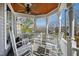 Charming front porch with rocking chairs and elegant ceiling at 207 Linden Ave, Raleigh, NC 27601