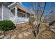 Inviting front porch featuring a ceiling fan and comfortable seating at 207 Linden Ave, Raleigh, NC 27601