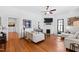 Spacious living room with an open layout, featuring hardwood floors and a fireplace at 207 Linden Ave, Raleigh, NC 27601