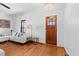 Cozy living room with hardwood floors and ample natural light at 207 Linden Ave, Raleigh, NC 27601