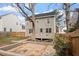 Backyard featuring a brick patio, lawn, and partial fencing at 2121 Ramsgate St, Raleigh, NC 27603