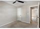 Cozy bedroom features neutral walls, carpet flooring and a ceiling fan at 2121 Ramsgate St, Raleigh, NC 27603