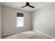 Neutral bedroom with wall to wall carpet and natural lighting at 2121 Ramsgate St, Raleigh, NC 27603