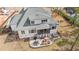 Aerial shot showcasing the backyard oasis, complete with a screened-in porch, patio, and hot tub at 2412 Toll Mill Ct, Raleigh, NC 27606