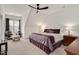 Bright bedroom with sitting area near a window and comfortable furniture at 2412 Toll Mill Ct, Raleigh, NC 27606
