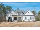 Beautifully built single-Gathering home with a well-manicured lawn and established trees at 2412 Toll Mill Ct, Raleigh, NC 27606
