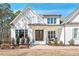 Charming home featuring a symmetrical facade and covered front porch at 2412 Toll Mill Ct, Raleigh, NC 27606