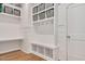 Well-organized mudroom featuring built-in storage, cubbies, hooks and a bench at 2412 Toll Mill Ct, Raleigh, NC 27606