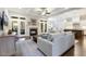 Open living space with a fireplace, coffered ceilings, and hardwood flooring at 242 Sweet Pine Cir, Pittsboro, NC 27312