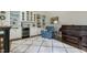 Comfortable living space showcasing built-in shelving, beverage cooler, and a stylish area rug at 242 Sweet Pine Cir, Pittsboro, NC 27312