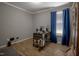 Versatile bedroom, shown here as an office, featuring modern desk setup and natural light at 2518 Pilot Riley Rd, Zebulon, NC 27597
