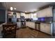 Updated kitchen featuring stainless steel appliances, white cabinetry, and modern countertops at 2518 Pilot Riley Rd, Zebulon, NC 27597