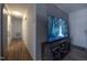 Cozy living room showcasing a large flat screen TV and hardwood style flooring at 2518 Pilot Riley Rd, Zebulon, NC 27597