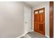 Welcoming entryway with wood-look flooring and white doors at 2606 Landis Dr, Durham, NC 27705