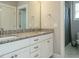 Bathroom featuring white cabinets, granite countertops, and double sinks at 2609 Packhouse Rd, Zebulon, NC 27597