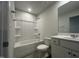 Clean and functional bathroom featuring a tub and shower combination, white vanity, and sink at 272 Johnson Ridge Way, Four Oaks, NC 27524