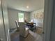Office space featuring a window, modern desk, and stylish decor at 272 Johnson Ridge Way, Four Oaks, NC 27524