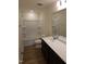 Bathroom features a bathtub with tile surround, a toilet, and a vanity with a sink at 28 Longdale Dr, Graham, NC 27253
