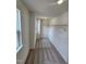 Spacious walk-in closet with carpet, single rod, and natural light at 28 Longdale Dr, Graham, NC 27253