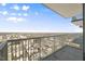 Enjoy sprawling city views from this condo balcony and its sleek, modern railing at 301 Fayetteville St # 3205, Raleigh, NC 27601