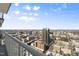Enjoy city views from the condo balcony with clear blue skies and an elegant railing at 301 Fayetteville St # 3205, Raleigh, NC 27601
