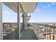 Enjoy clear city views from this spacious condo balcony with sleek railing and glass door access at 301 Fayetteville St # 3205, Raleigh, NC 27601