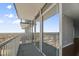 Modern condo balcony with glass doors provides seamless indoor-outdoor living with expansive views at 301 Fayetteville St # 3205, Raleigh, NC 27601