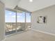 Cozy bedroom featuring a large window, closet and neutral carpet to make you feel at home at 301 Fayetteville St # 3205, Raleigh, NC 27601