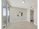 Comfortable bedroom with large windows boasting city views and attached closet at 301 Fayetteville St # 3205, Raleigh, NC 27601