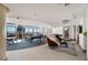 Spacious clubhouse with a pool table and floor-to-ceiling windows offering skyline views at 301 Fayetteville St # 3205, Raleigh, NC 27601