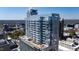 Exterior of a high-rise building showcasing the pool and terrace at 301 Fayetteville St # 3205, Raleigh, NC 27601