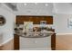 Kitchen island with granite countertop, stainless steel sink and faucet, with open floorplan at 301 Fayetteville St # 3205, Raleigh, NC 27601