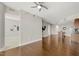 Open-concept living room showcases sleek hardwood floors connecting to the kitchen and bedroom at 301 Fayetteville St # 3205, Raleigh, NC 27601