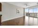 Bright living room with floor-to-ceiling windows offers stunning city views and ample natural light at 301 Fayetteville St # 3205, Raleigh, NC 27601