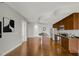 Bright and airy open floorplan featuring hardwood floors and stainless steel appliances at 301 Fayetteville St # 3205, Raleigh, NC 27601