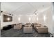 Cozy movie room with plush seating, a large screen, and dim lighting at 301 Fayetteville St # 3205, Raleigh, NC 27601