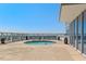 Modern rooftop pool with comfortable surrounding patio area and scenic city views at 301 Fayetteville St # 3205, Raleigh, NC 27601