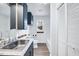 Bathroom features a sink and plenty of storage space with a view out a small window at 307 S Main St, Four Oaks, NC 27524
