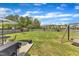 Great backyard space featuring a patio, barbecue grill, swing set and ample room for recreation at 310 Mineral Spring Ln, Fuquay Varina, NC 27526