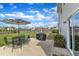 Spacious backyard with patio including outdoor seating and BBQ grill, perfect for entertaining and relaxation at 310 Mineral Spring Ln, Fuquay Varina, NC 27526