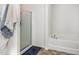 Clean bathroom design features a bathtub and shower, and a non-slip mat for safety at 310 Mineral Spring Ln, Fuquay Varina, NC 27526