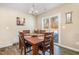 Cozy dining area featuring natural light and an inviting space for meals with Gathering and friends at 310 Mineral Spring Ln, Fuquay Varina, NC 27526