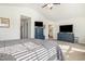 Bright main bedroom with vaulted ceilings, plush carpet, and large dresser at 310 Mineral Spring Ln, Fuquay Varina, NC 27526