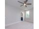Bedroom featuring a ceiling fan, window, and an ensuite bathroom at 4225 Burlington Mills Rd, Wake Forest, NC 27587