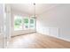 Elegant dining room featuring hardwood floors, recessed lighting, and large picture windows at 4225 Burlington Mills Rd, Wake Forest, NC 27587
